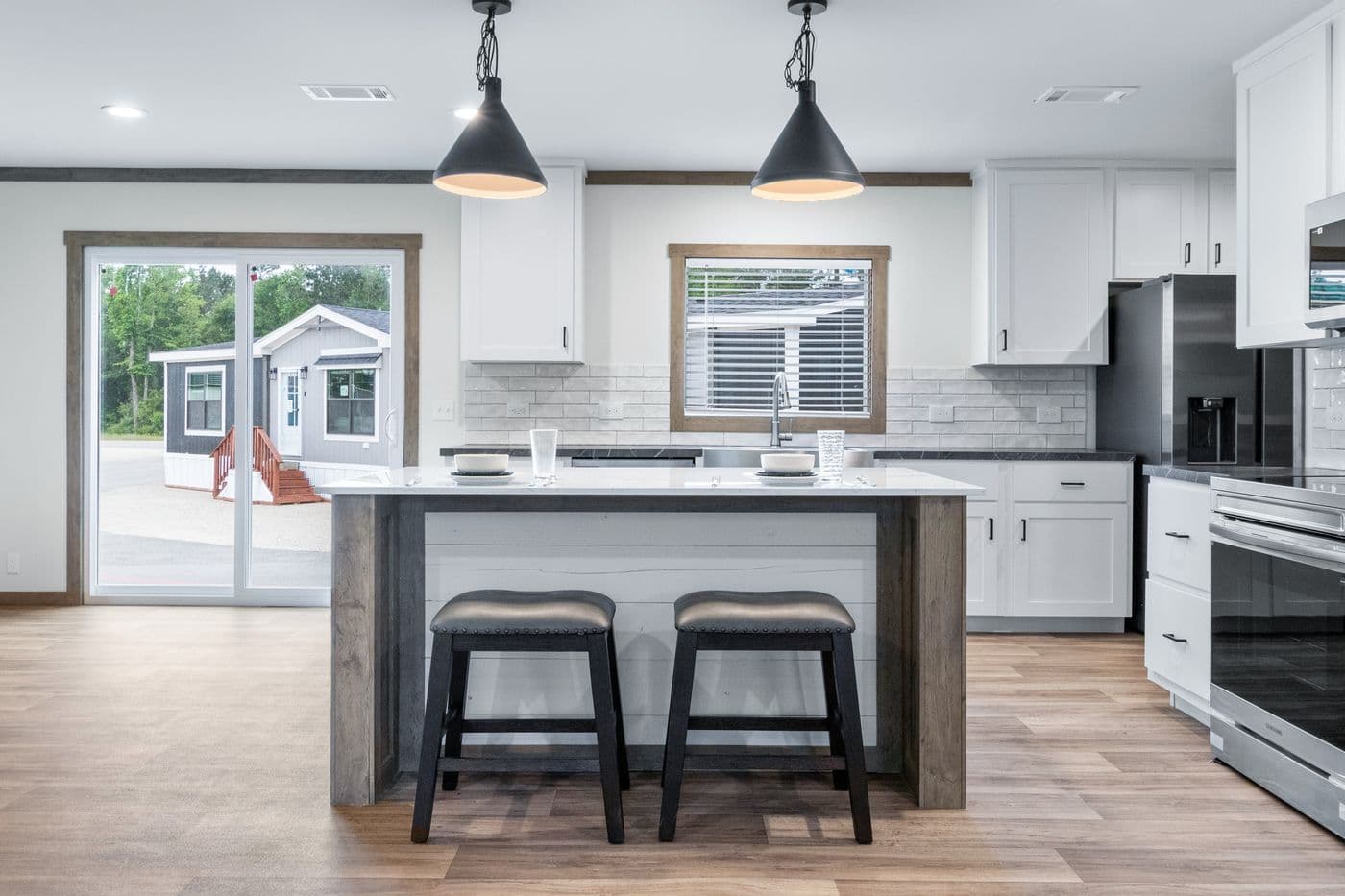 The EMILIE ELITE Exterior. This Manufactured Mobile Home features 3 bedrooms and 2 baths.