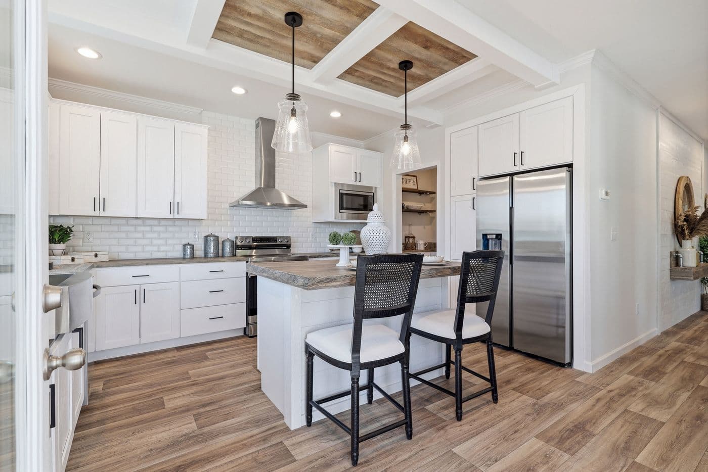 The SOUTHERN CHARM Exterior. This Manufactured Mobile Home features 3 bedrooms and 2 baths.