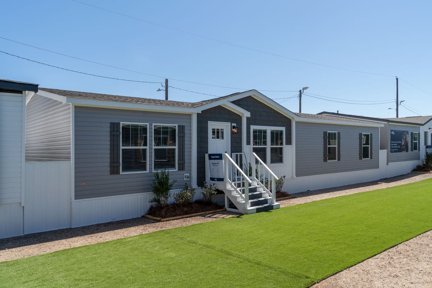 The THE VOGUE 60 Exterior. This Manufactured Mobile Home features 3 bedrooms and 2 baths.