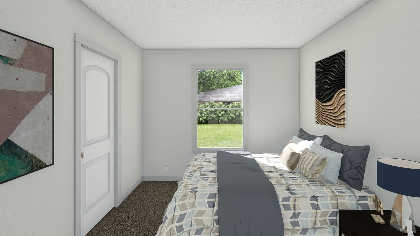 The 2003 ROCKET MAN 66X28 MOD Exterior. This Modular Home features 3 bedrooms and 2 baths.