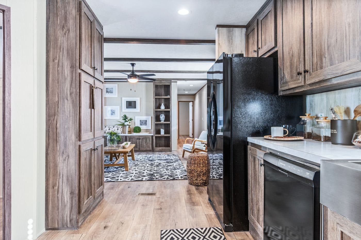 The ANNIVERSARY 16763F Kitchen. This Manufactured Mobile Home features 3 bedrooms and 2 baths.