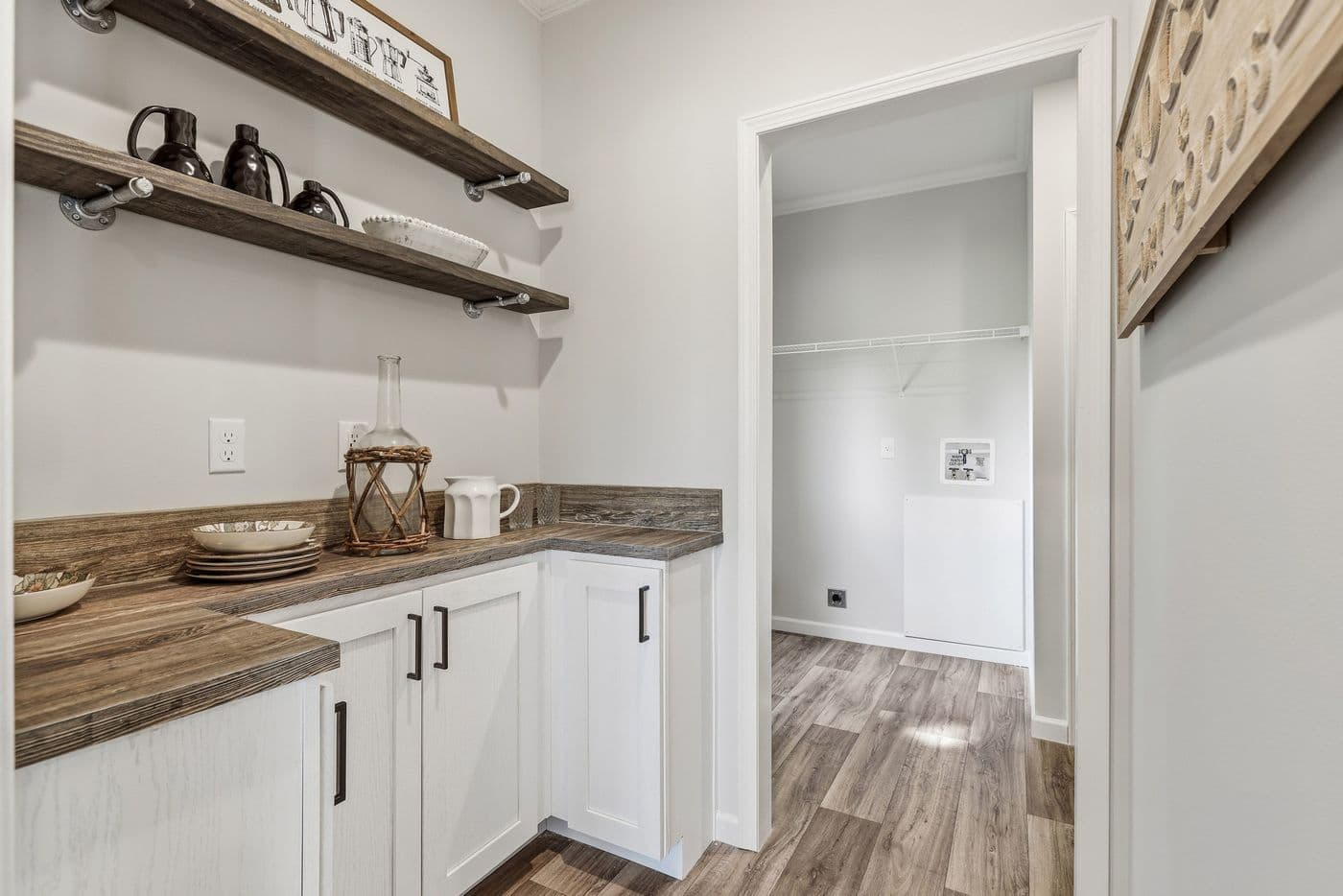 The SOUTHERN CHARM Exterior. This Manufactured Mobile Home features 3 bedrooms and 2 baths.