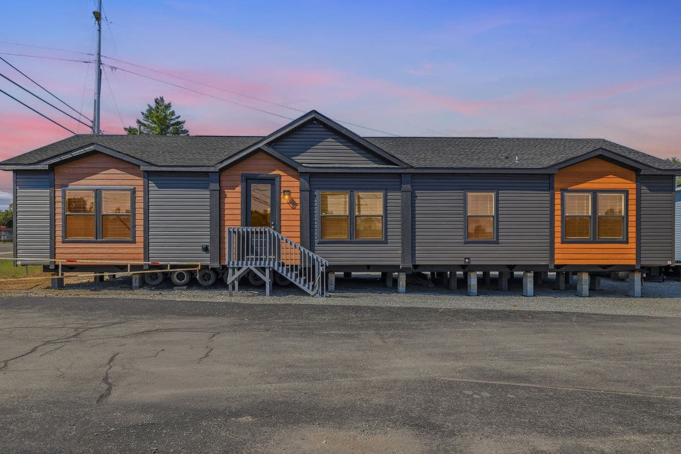 The SUPER 68 ELITE Exterior. This Manufactured Mobile Home features 3 bedrooms and 2 baths.