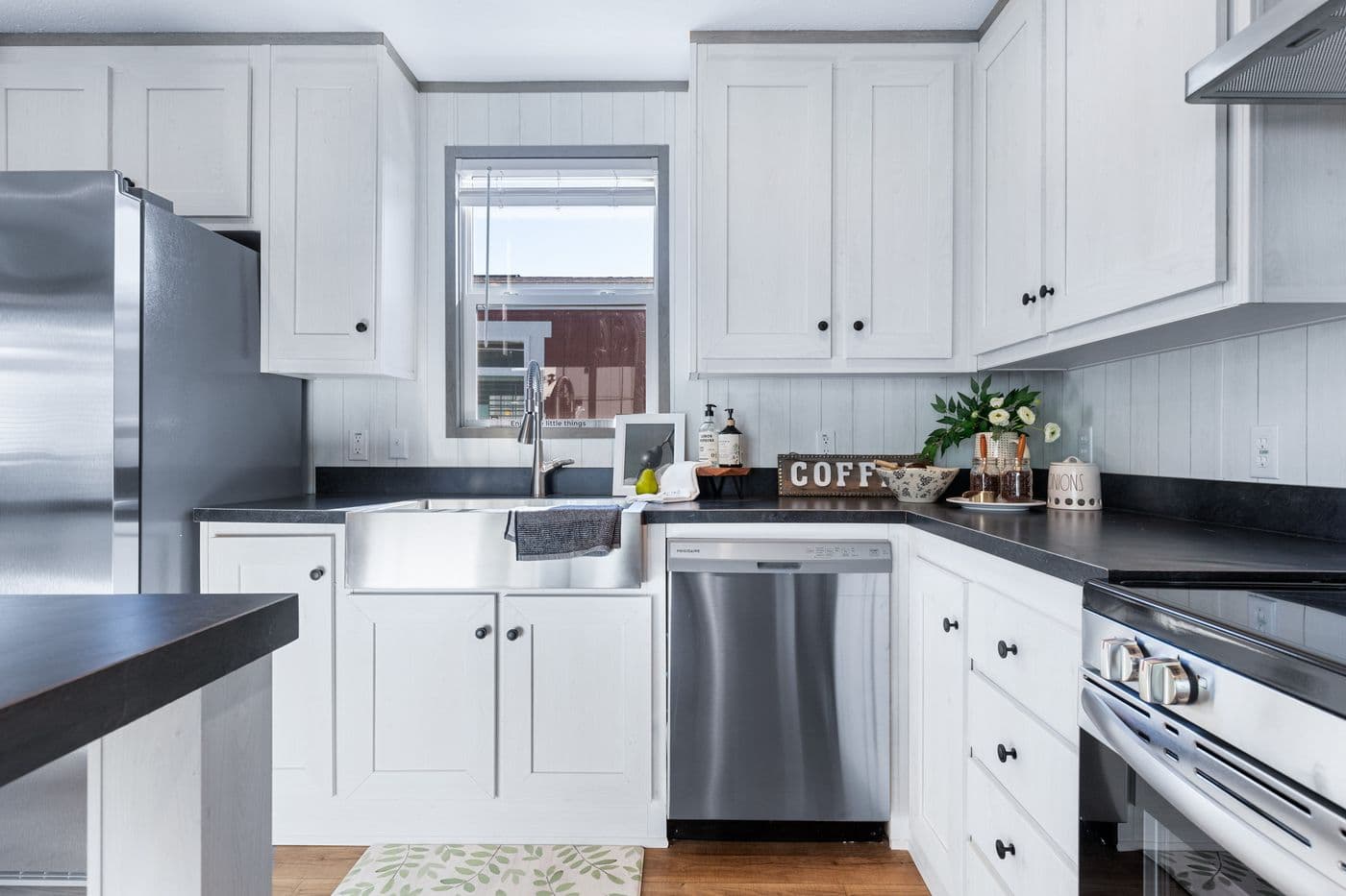 The ANNIVERSARY 16763I Kitchen. This Manufactured Mobile Home features 3 bedrooms and 2 baths.