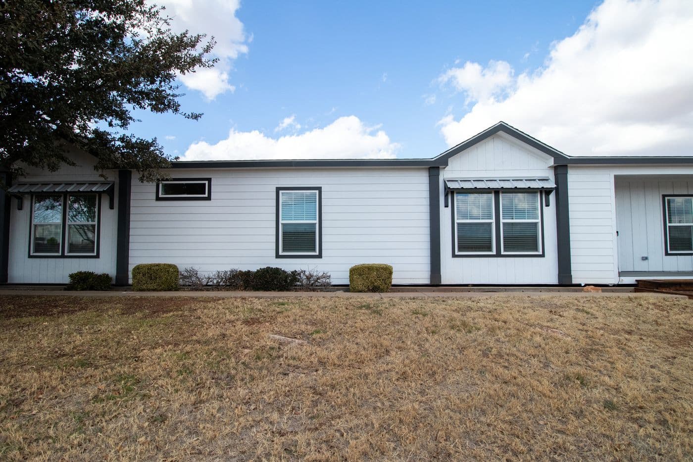 The THE SEDONA 4 Exterior. This Manufactured Mobile Home features 4 bedrooms and 2 baths.