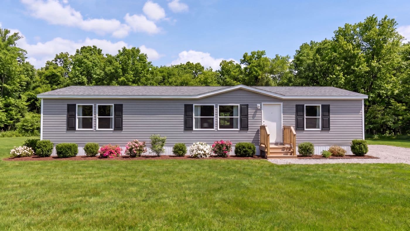 The SPRUCE Exterior. This Manufactured Mobile Home features 3 bedrooms and 2 baths.