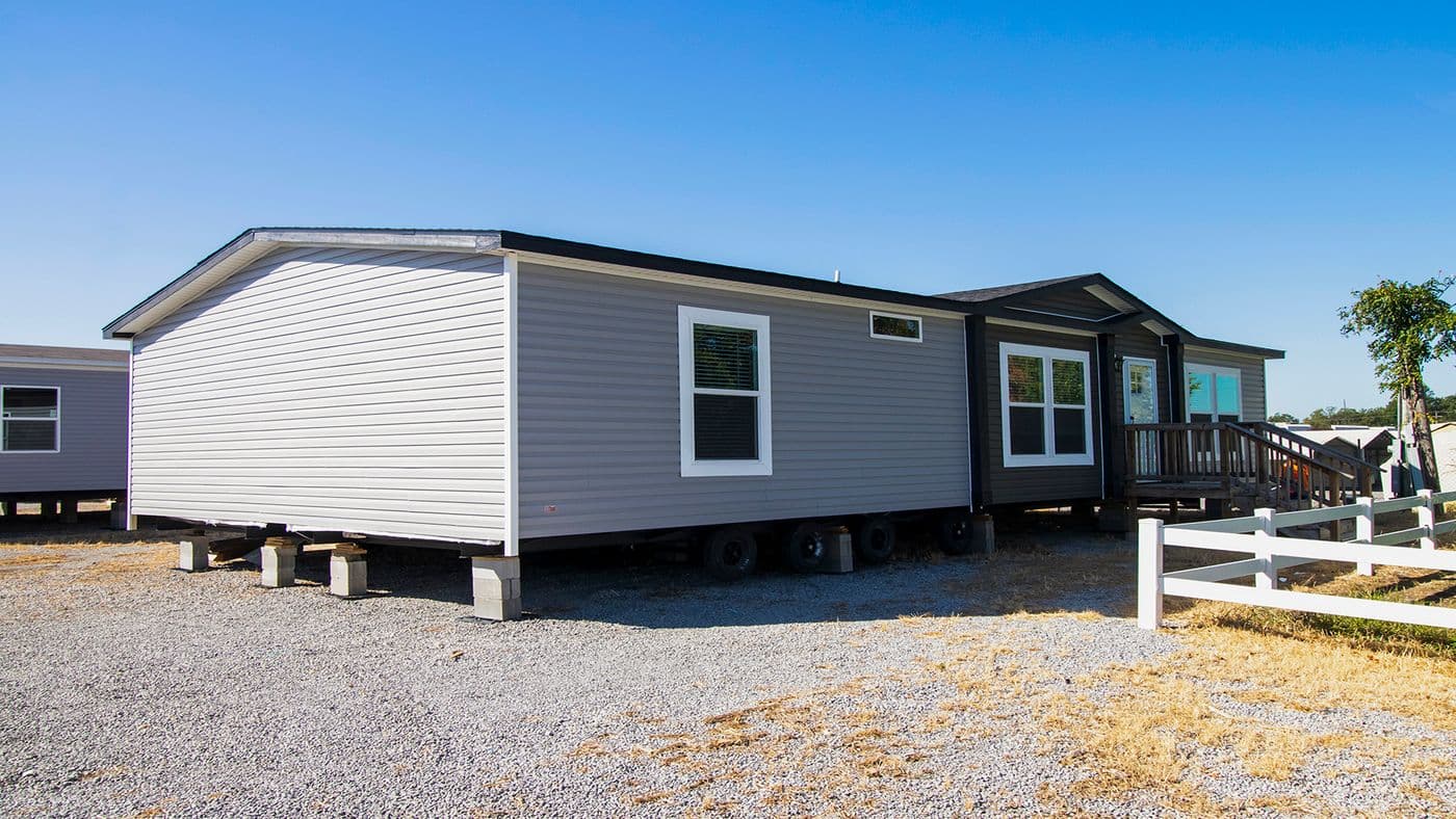 The THE BIG DEAL 52 Exterior. This Manufactured Mobile Home features 3 bedrooms and 2 baths.