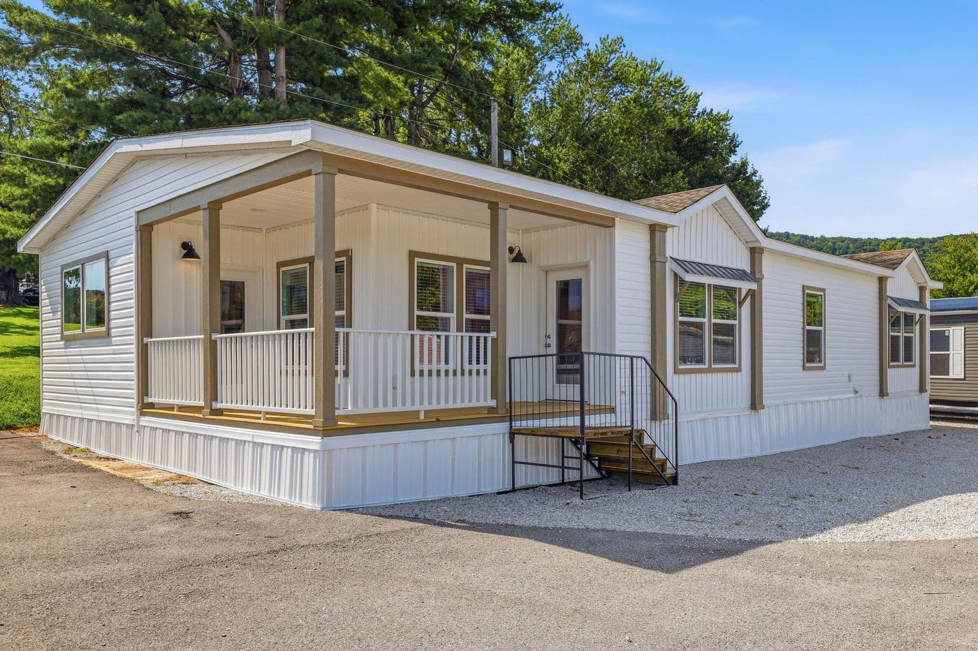 The SOUTHERN CHARM Exterior. This Manufactured Mobile Home features 3 bedrooms and 2 baths.