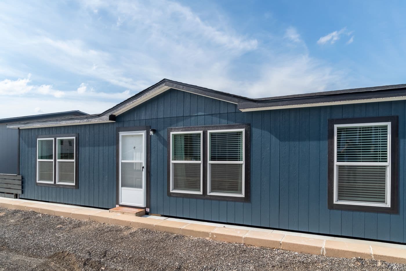 The ECLIPSE Exterior. This Manufactured Mobile Home features 4 bedrooms and 2 baths.