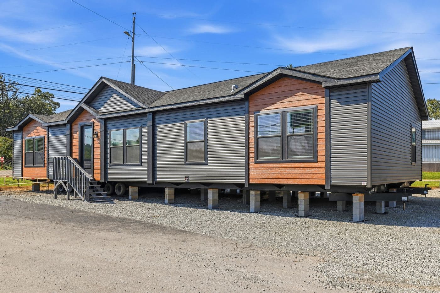 The SUPER 68 ELITE Exterior. This Manufactured Mobile Home features 3 bedrooms and 2 baths.