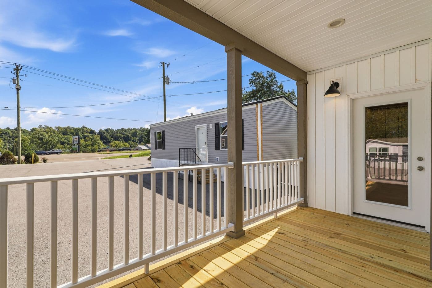 The SOUTHERN CHARM Exterior. This Manufactured Mobile Home features 3 bedrooms and 2 baths.