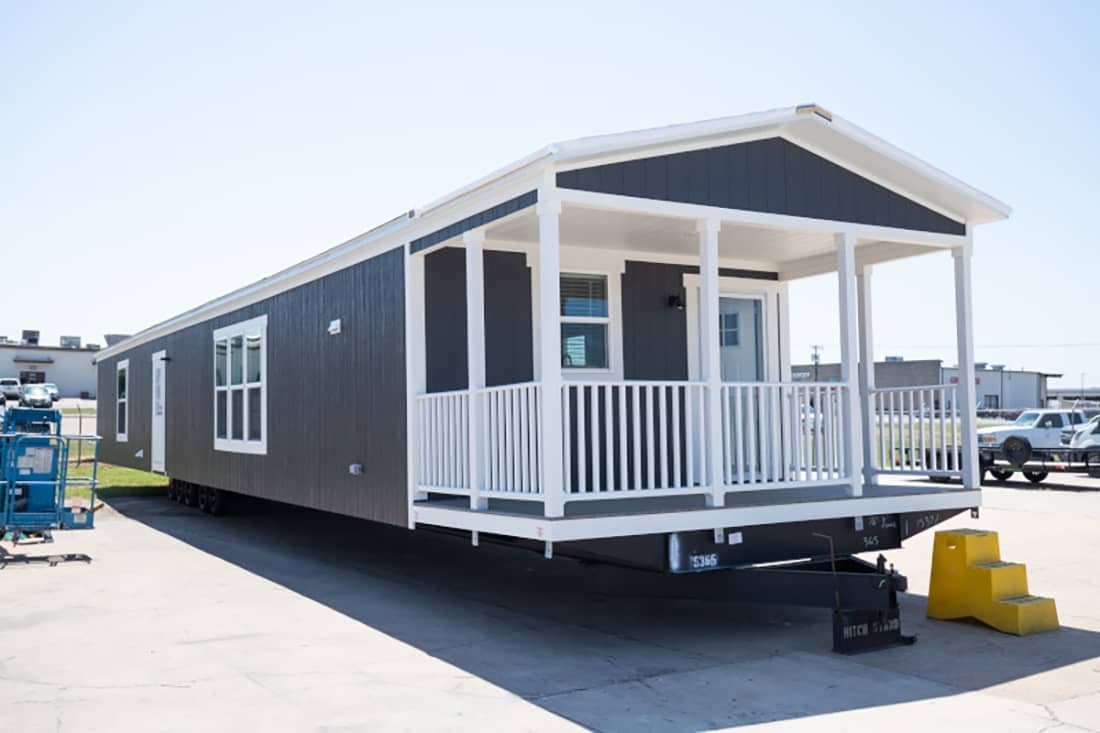 The RETREAT LIVING 16682A Exterior. This Manufactured Mobile Home features 2 bedrooms and 2 baths.