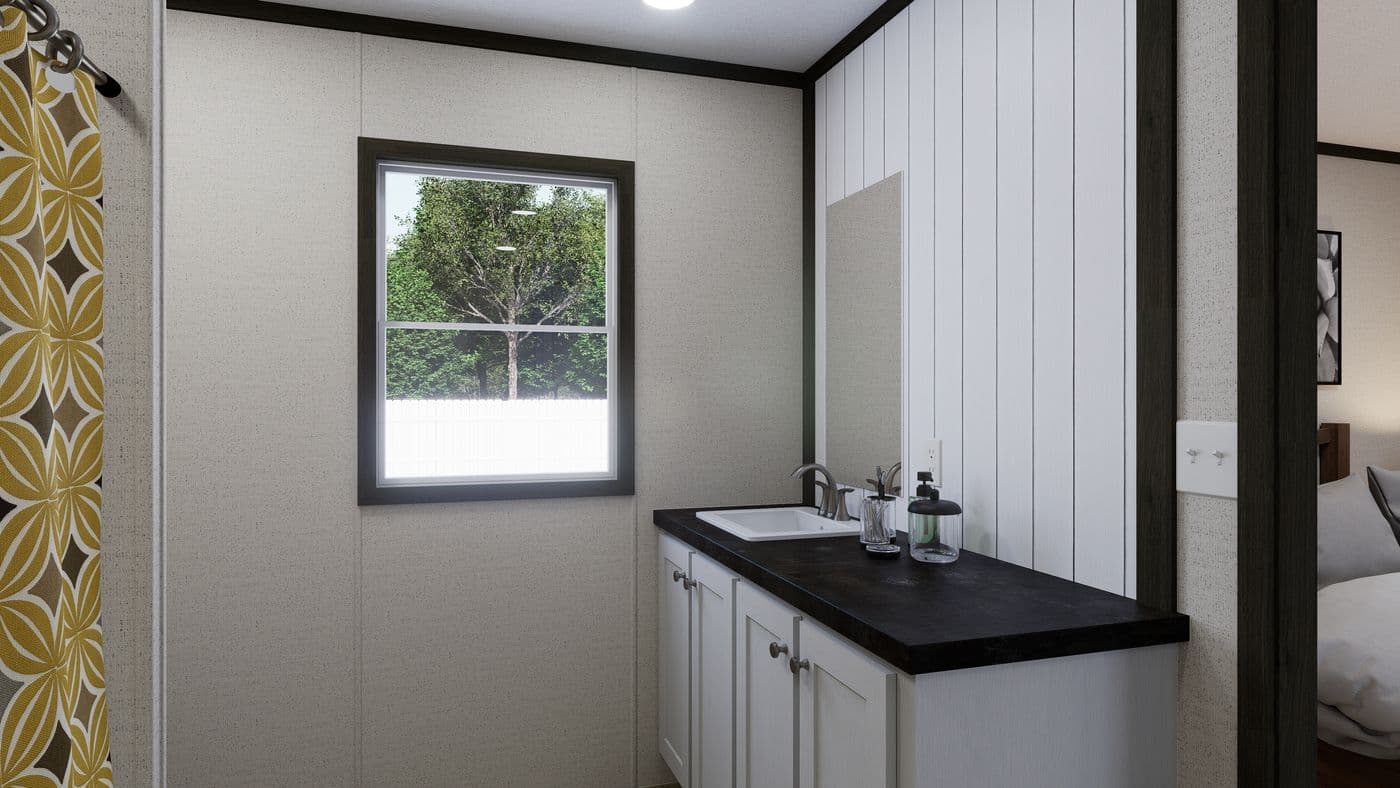 The THE RALLY Exterior. This Manufactured Mobile Home features 3 bedrooms and 2 baths.