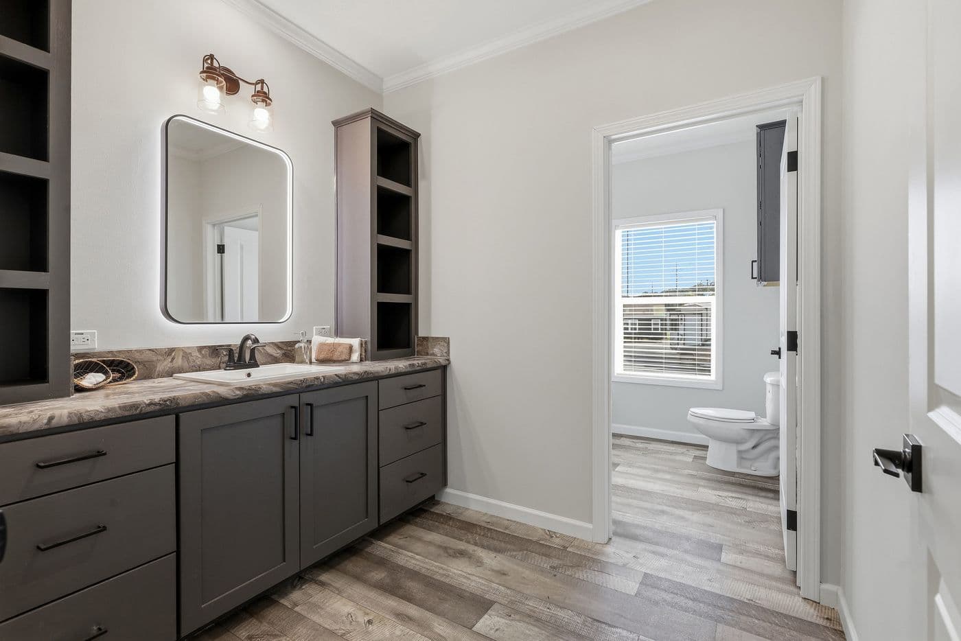 The SUPER 68 ELITE Exterior. This Manufactured Mobile Home features 3 bedrooms and 2 baths.