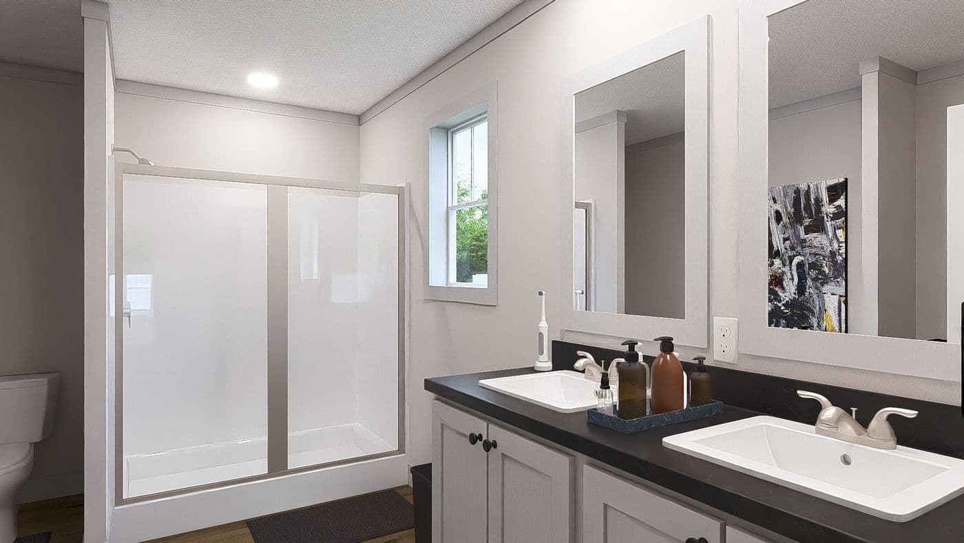 The STAYIN ALIVE Exterior. This Manufactured Mobile Home features 3 bedrooms and 2 baths.