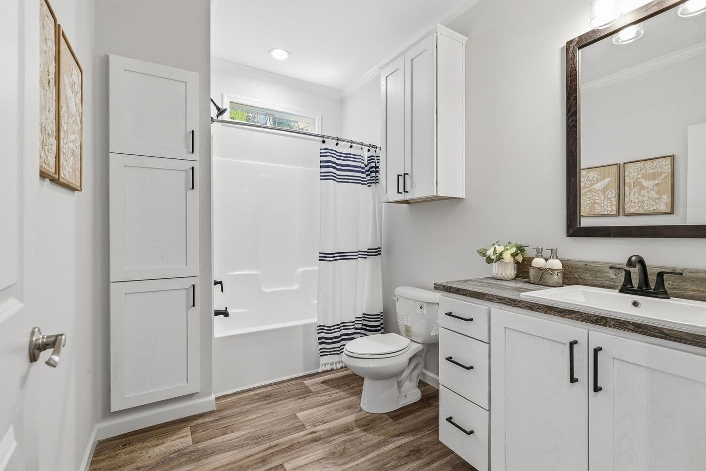 The SOUTHERN CHARM Exterior. This Manufactured Mobile Home features 3 bedrooms and 2 baths.