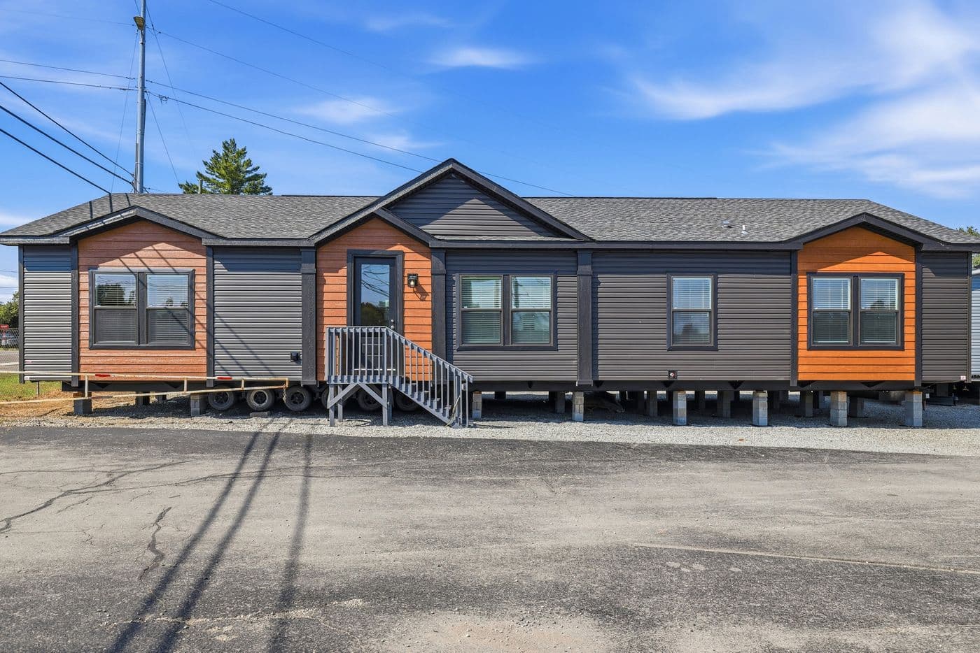 The SUPER 68 ELITE Exterior. This Manufactured Mobile Home features 3 bedrooms and 2 baths.