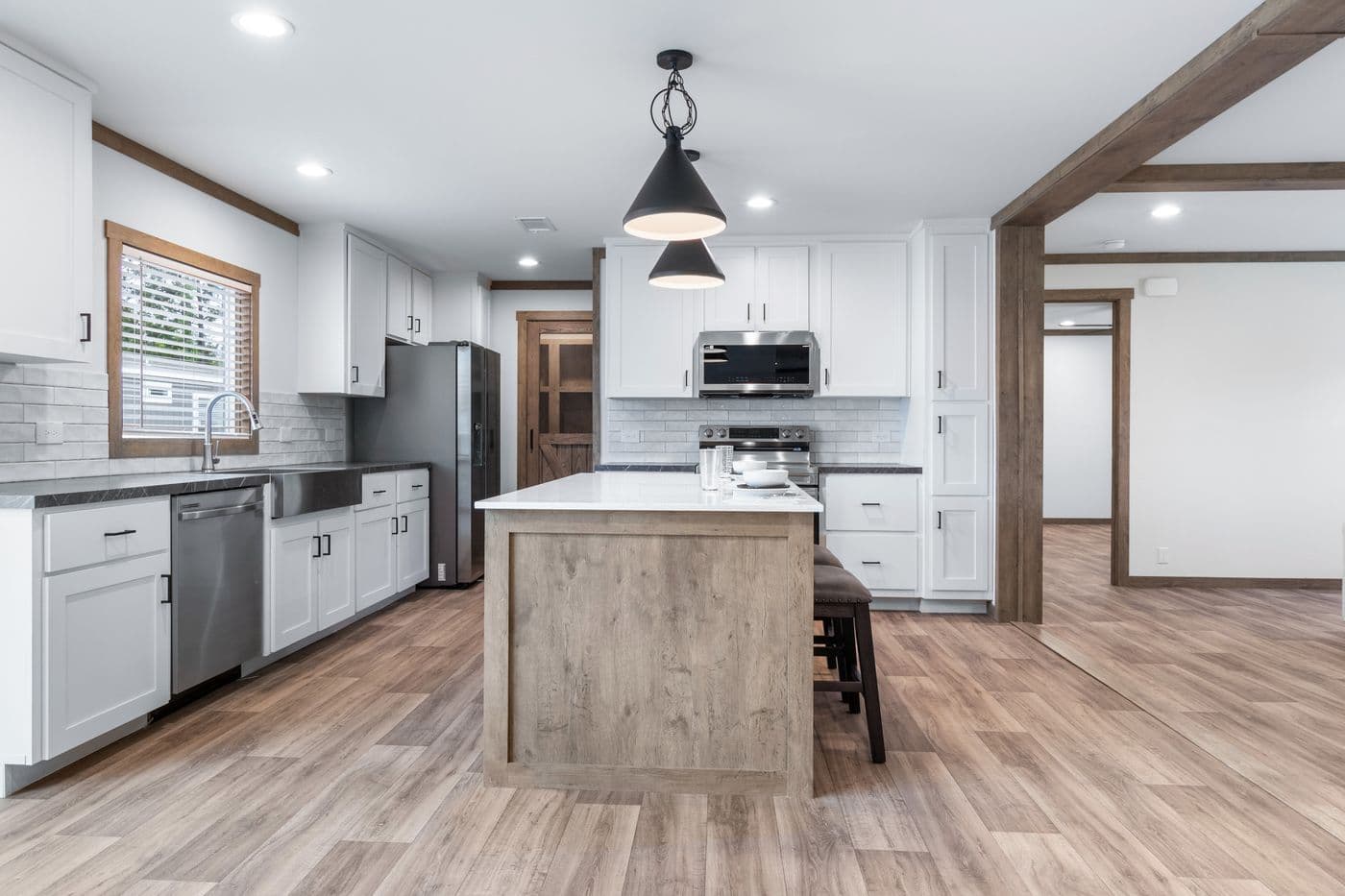 The EMILIE ELITE Exterior. This Manufactured Mobile Home features 3 bedrooms and 2 baths.