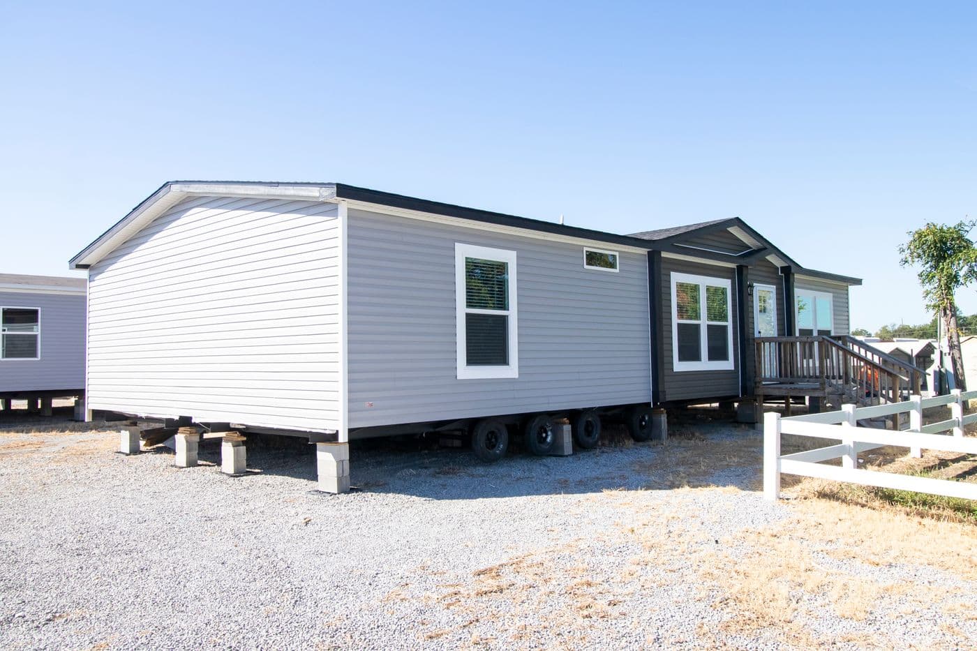 The THE BIG DEAL 52 Exterior. This Manufactured Mobile Home features 3 bedrooms and 2 baths.