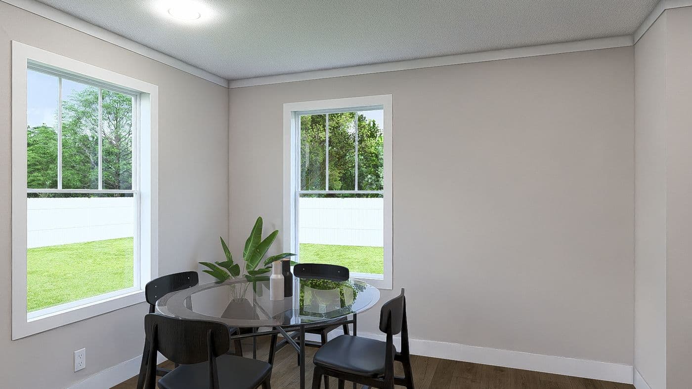 The THREE LITTLE BIRDS Exterior. This Manufactured Mobile Home features 3 bedrooms and 2 baths.