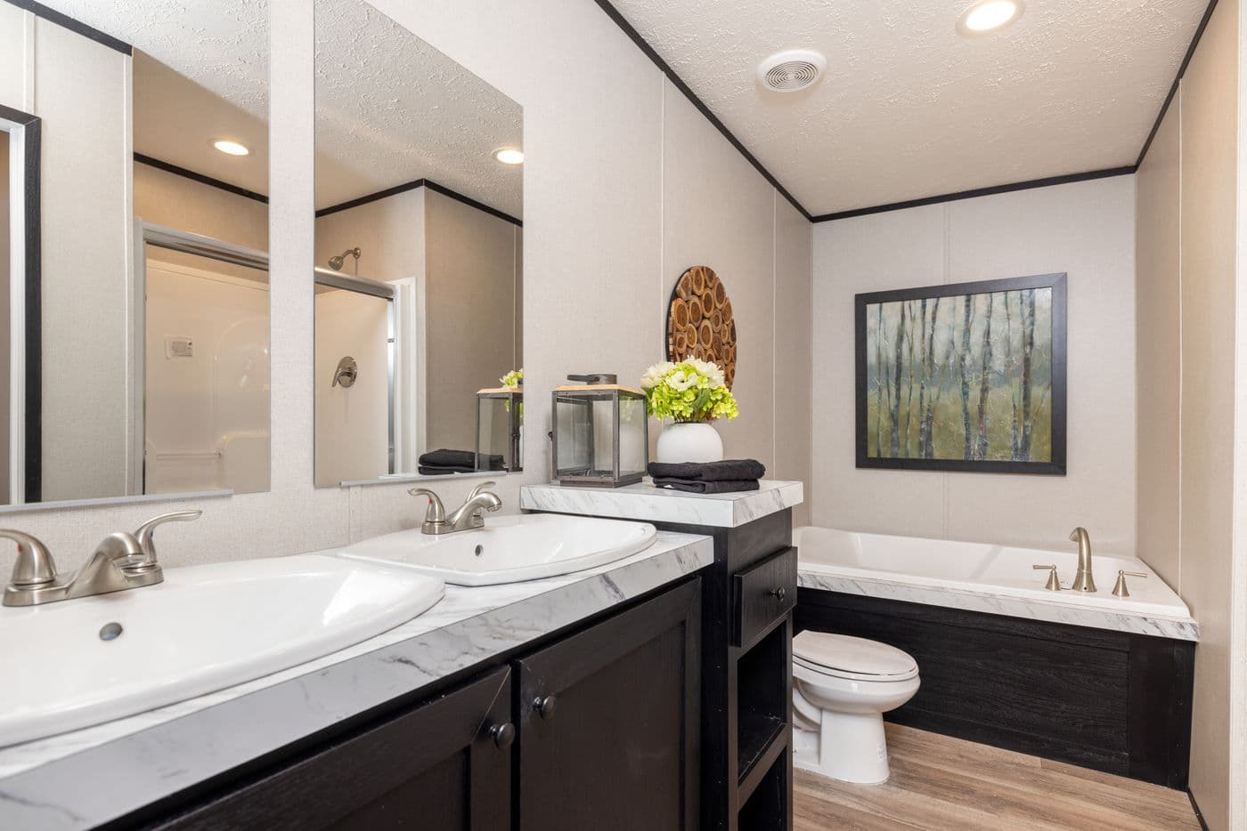 The PLATINUM ANNIVERSARY Exterior. This Manufactured Mobile Home features 3 bedrooms and 2 baths.