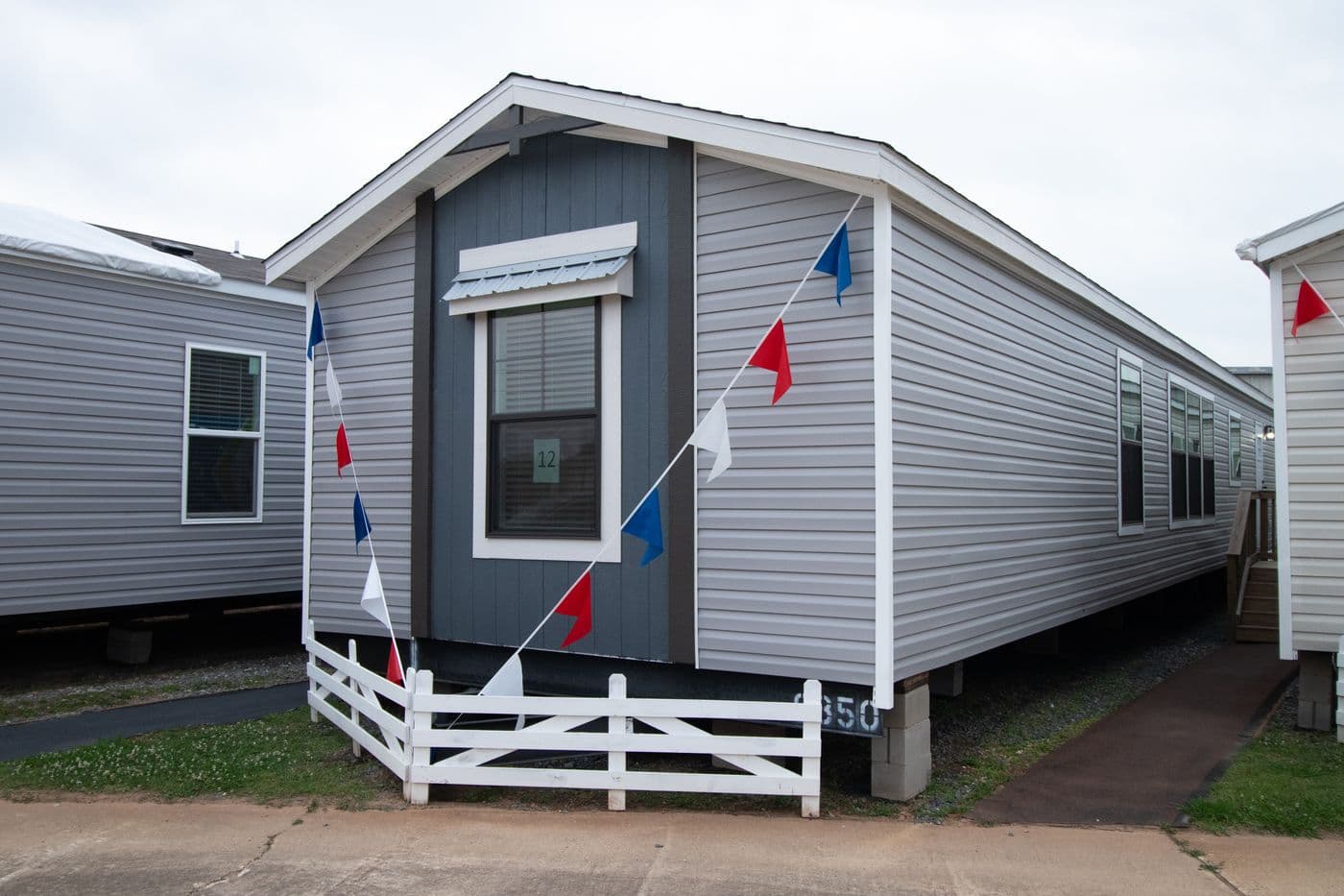 The LEXI Exterior. This Manufactured Mobile Home features 3 bedrooms and 2 baths.