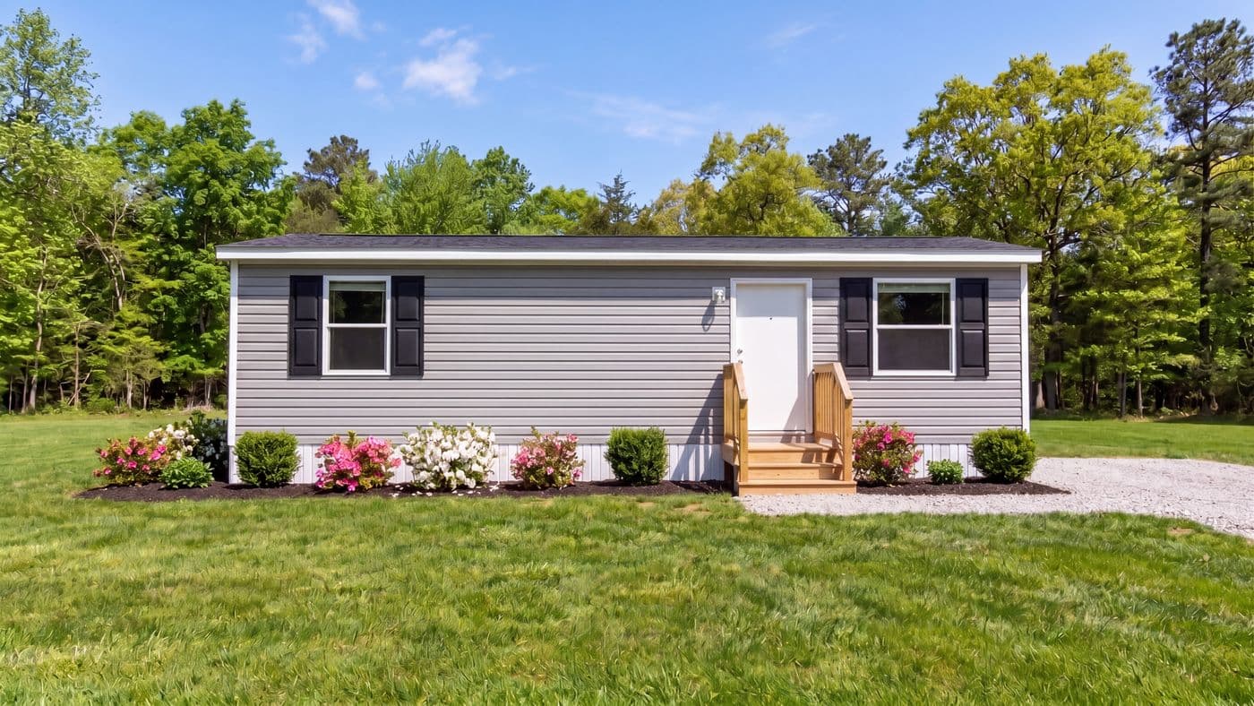 The BUTTERCUP Exterior. This Manufactured Mobile Home features 1 bedroom and 1 bath.