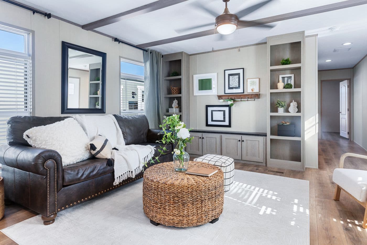 The ANNIVERSARY 16763I Living Room. This Manufactured Mobile Home features 3 bedrooms and 2 baths.