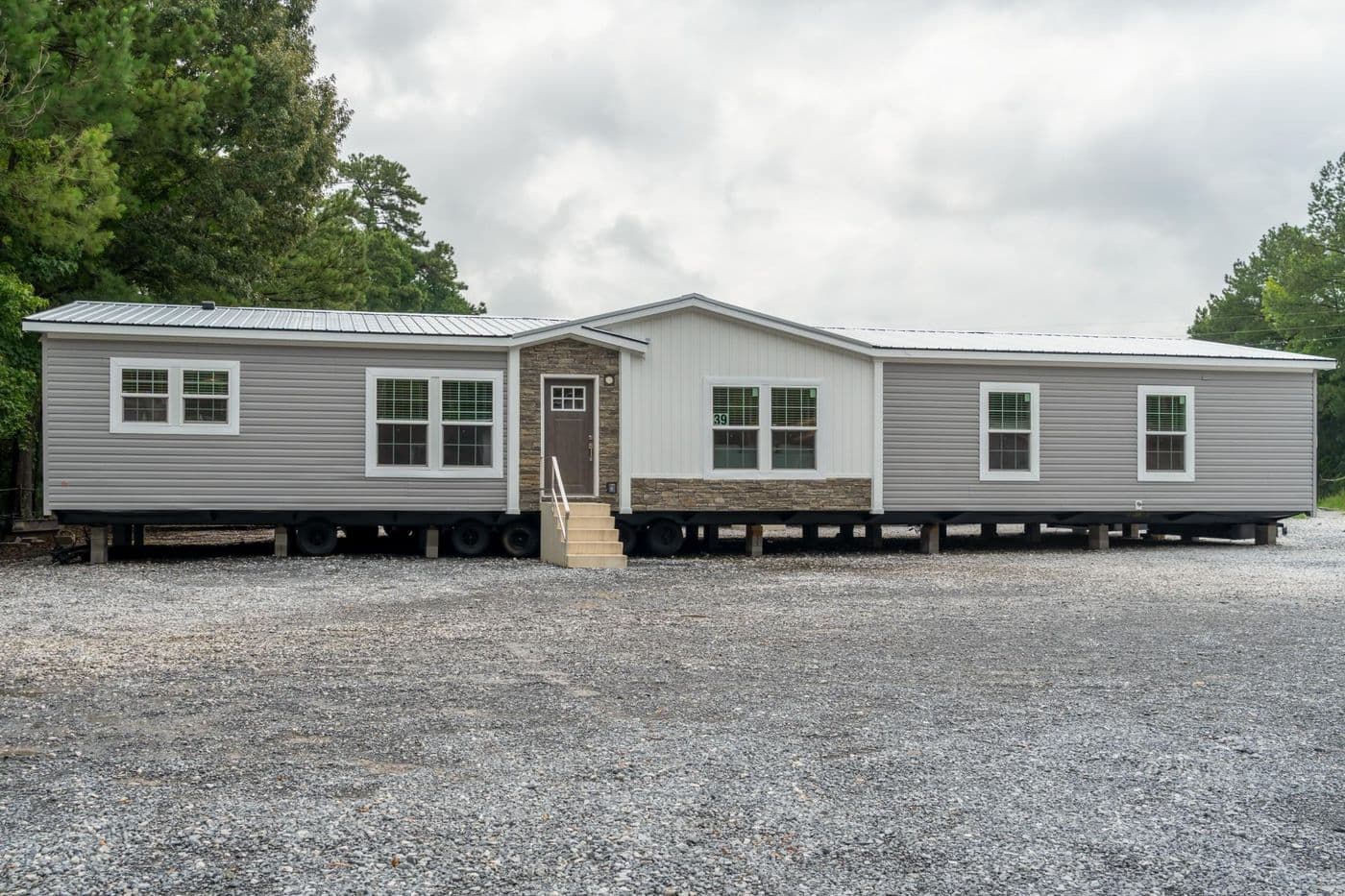The THE CAROLINA Exterior. This Manufactured Mobile Home features 4 bedrooms and 2 baths.