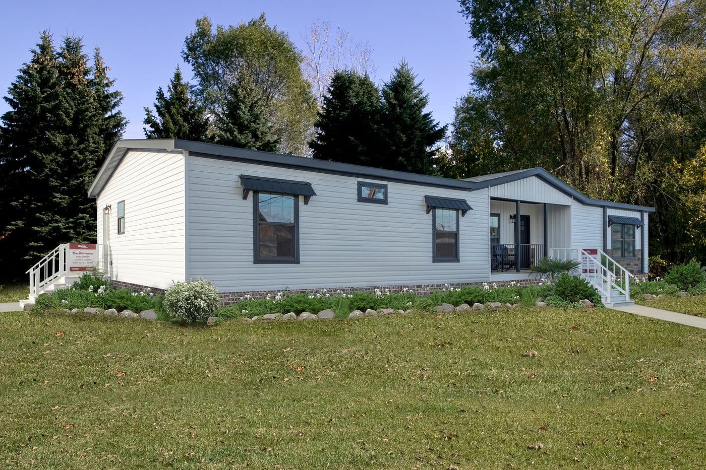 The THE MILL HOUSE Exterior. This Manufactured Mobile Home features 3 bedrooms and 2 baths.