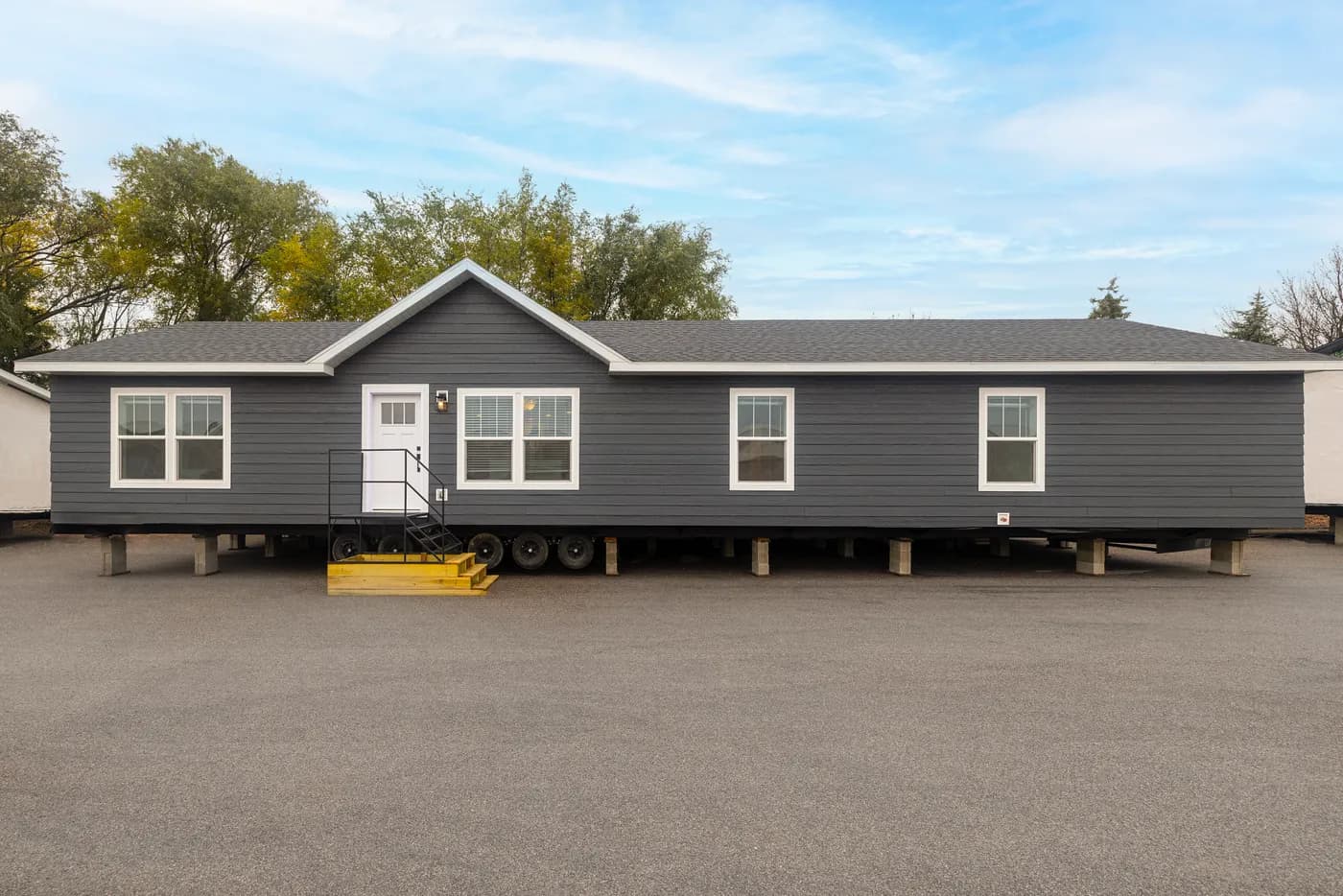 The HEY JUDE Exterior. This Manufactured Mobile Home features 4 bedrooms and 2 baths.