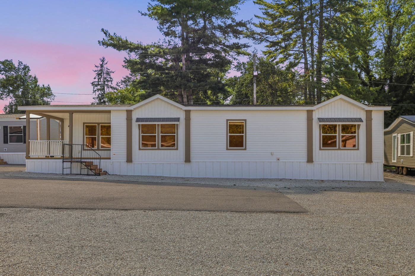 The SOUTHERN CHARM Exterior. This Manufactured Mobile Home features 3 bedrooms and 2 baths.