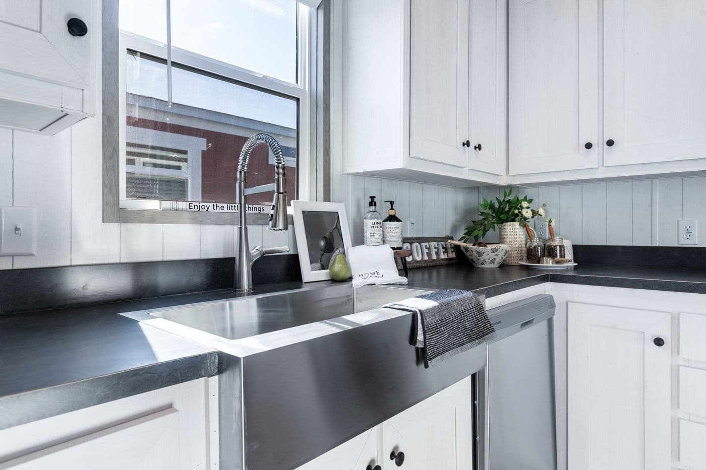 The ANNIVERSARY 16763I Kitchen. This Manufactured Mobile Home features 3 bedrooms and 2 baths.