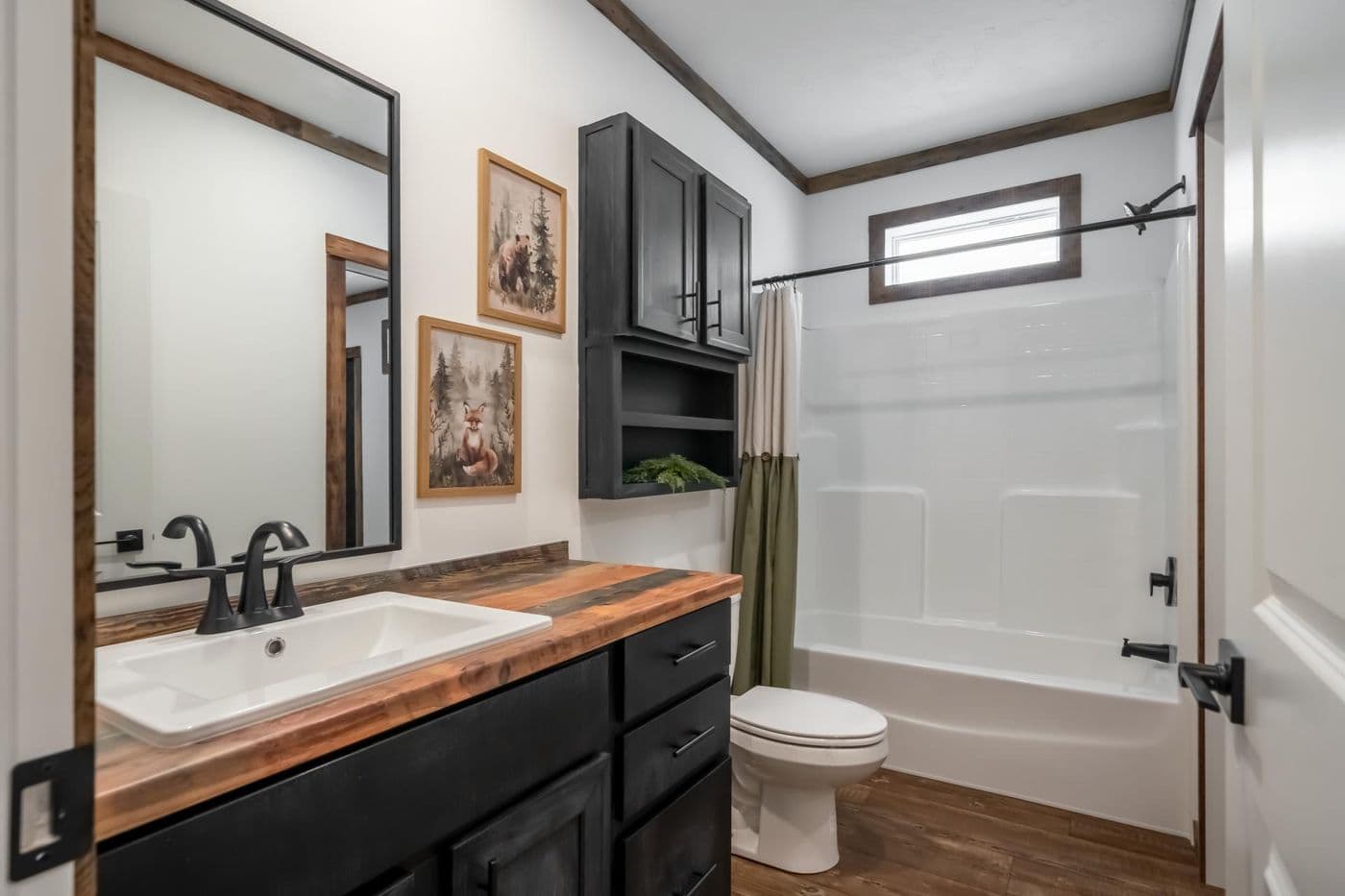 The THE MAGNOLIA Exterior. This Manufactured Mobile Home features 4 bedrooms and 3 baths.