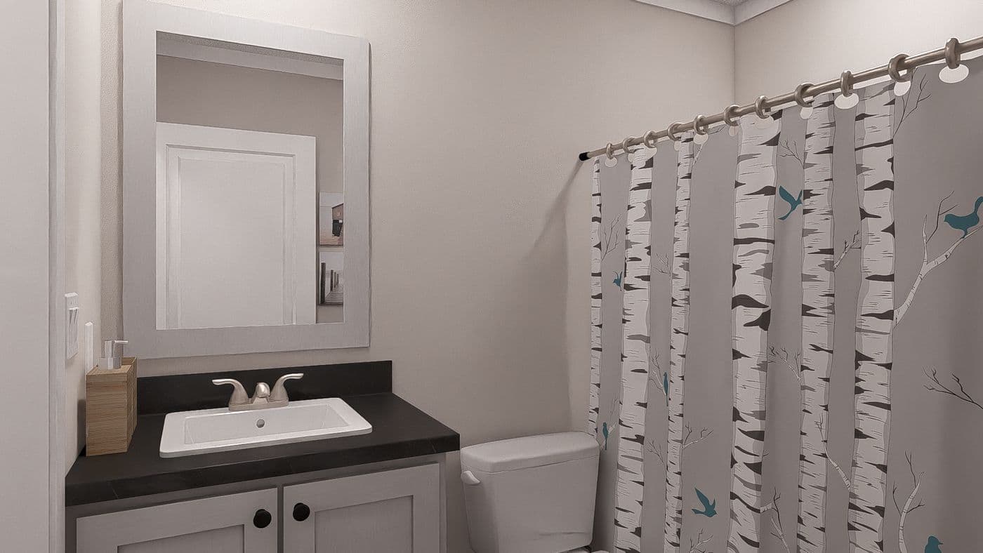 The STILL THE ONE Exterior. This Manufactured Mobile Home features 2 bedrooms and 2 baths.
