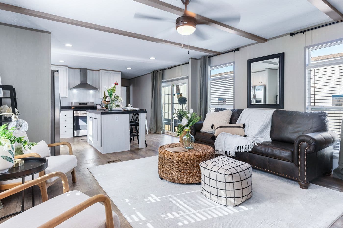The ANNIVERSARY 16763I Living Room. This Manufactured Mobile Home features 3 bedrooms and 2 baths.