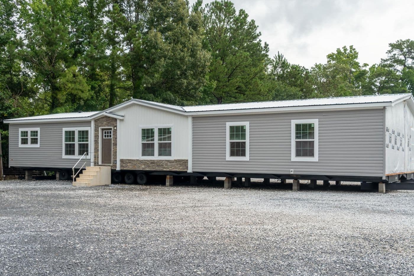 The THE CAROLINA Exterior. This Manufactured Mobile Home features 4 bedrooms and 2 baths.