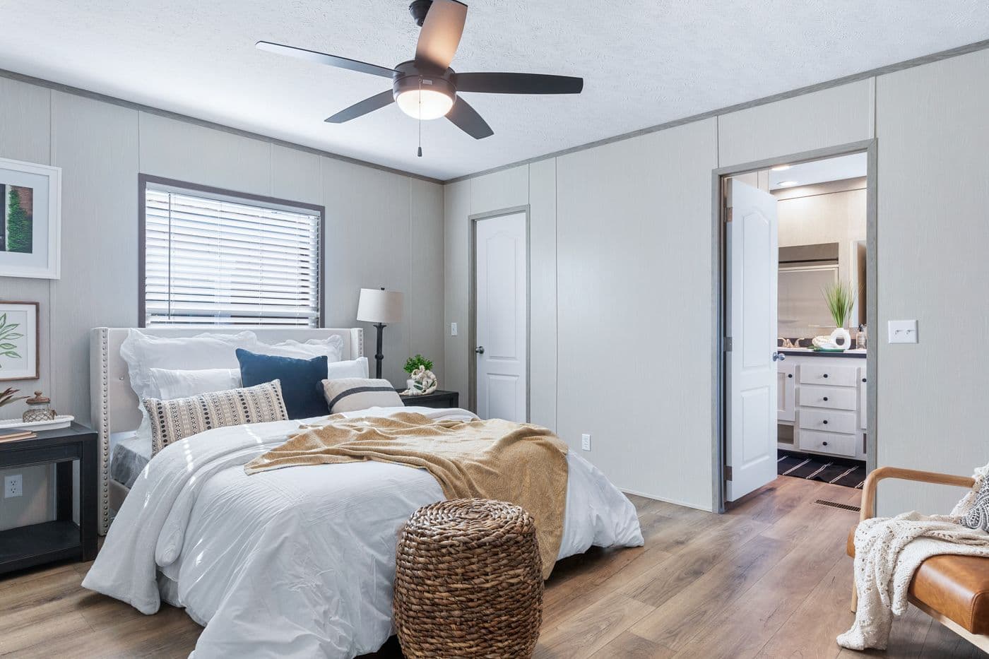The ANNIVERSARY 16763I Primary Bedroom. This Manufactured Mobile Home features 3 bedrooms and 2 baths.