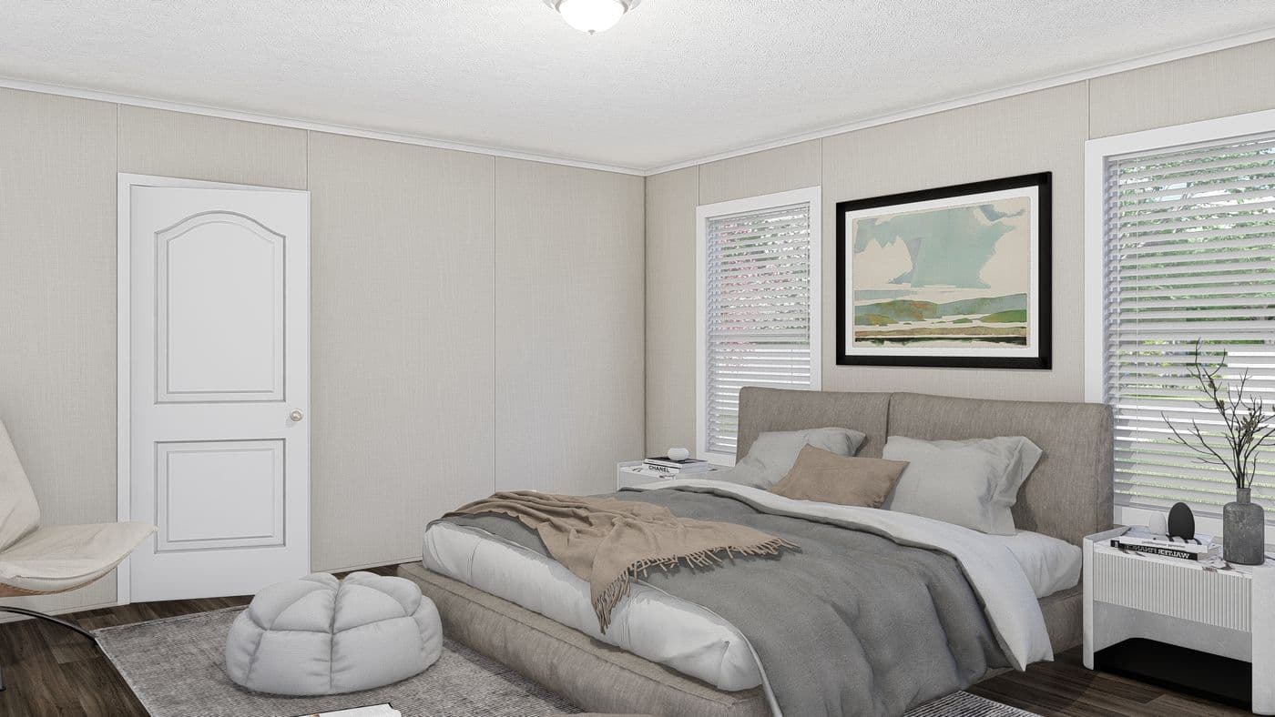 The THE FUSION 32H Primary Bedroom. This Manufactured Mobile Home features 5 bedrooms and 3 baths.