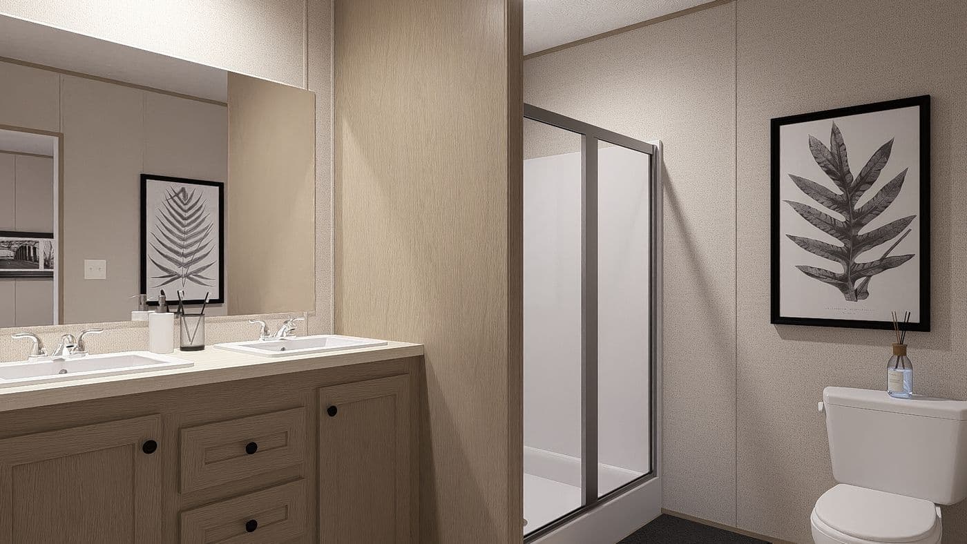 The BLAZER 66 B Primary Bathroom. This Manufactured Mobile Home features 3 bedrooms and 2 baths.
