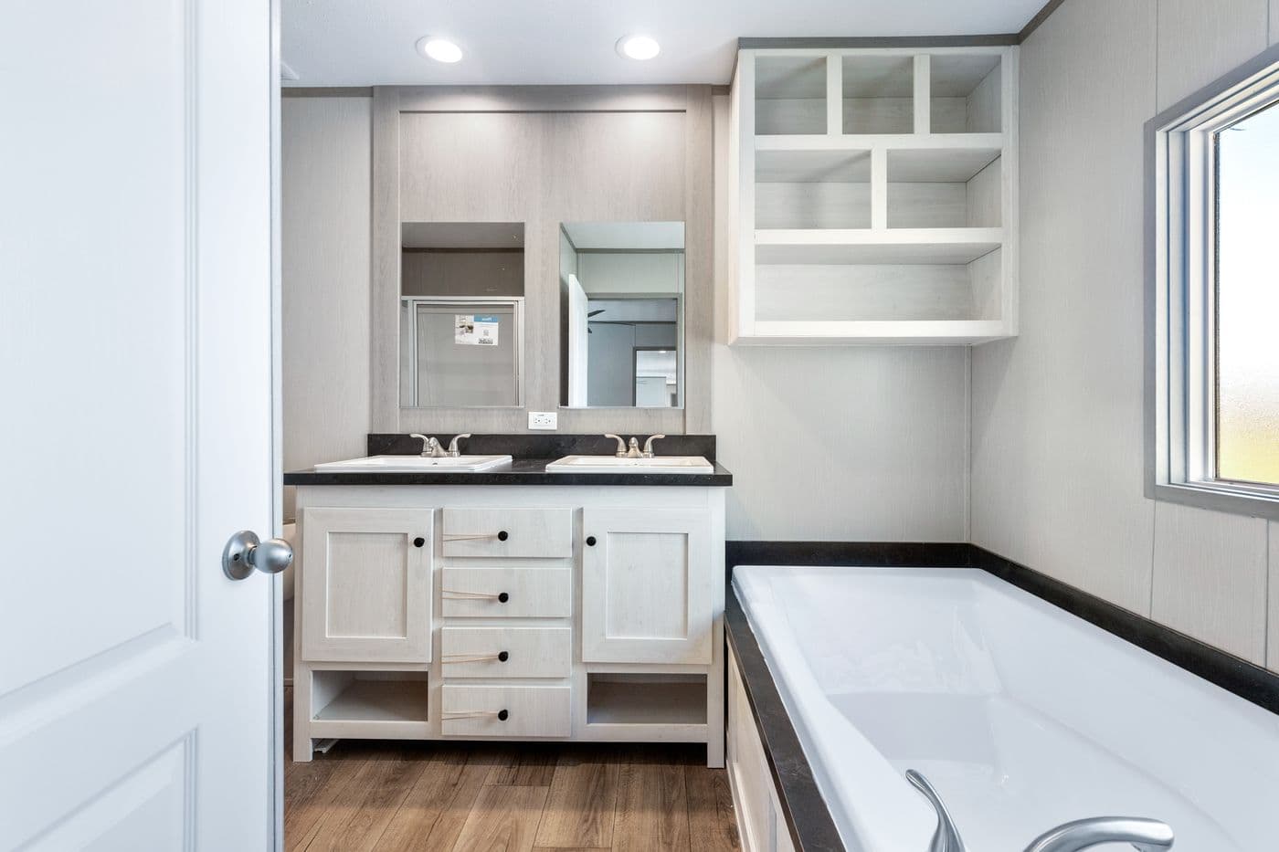 The RESOLUTION 16763K Primary Bathroom. This Manufactured Mobile Home features 3 bedrooms and 2 baths.