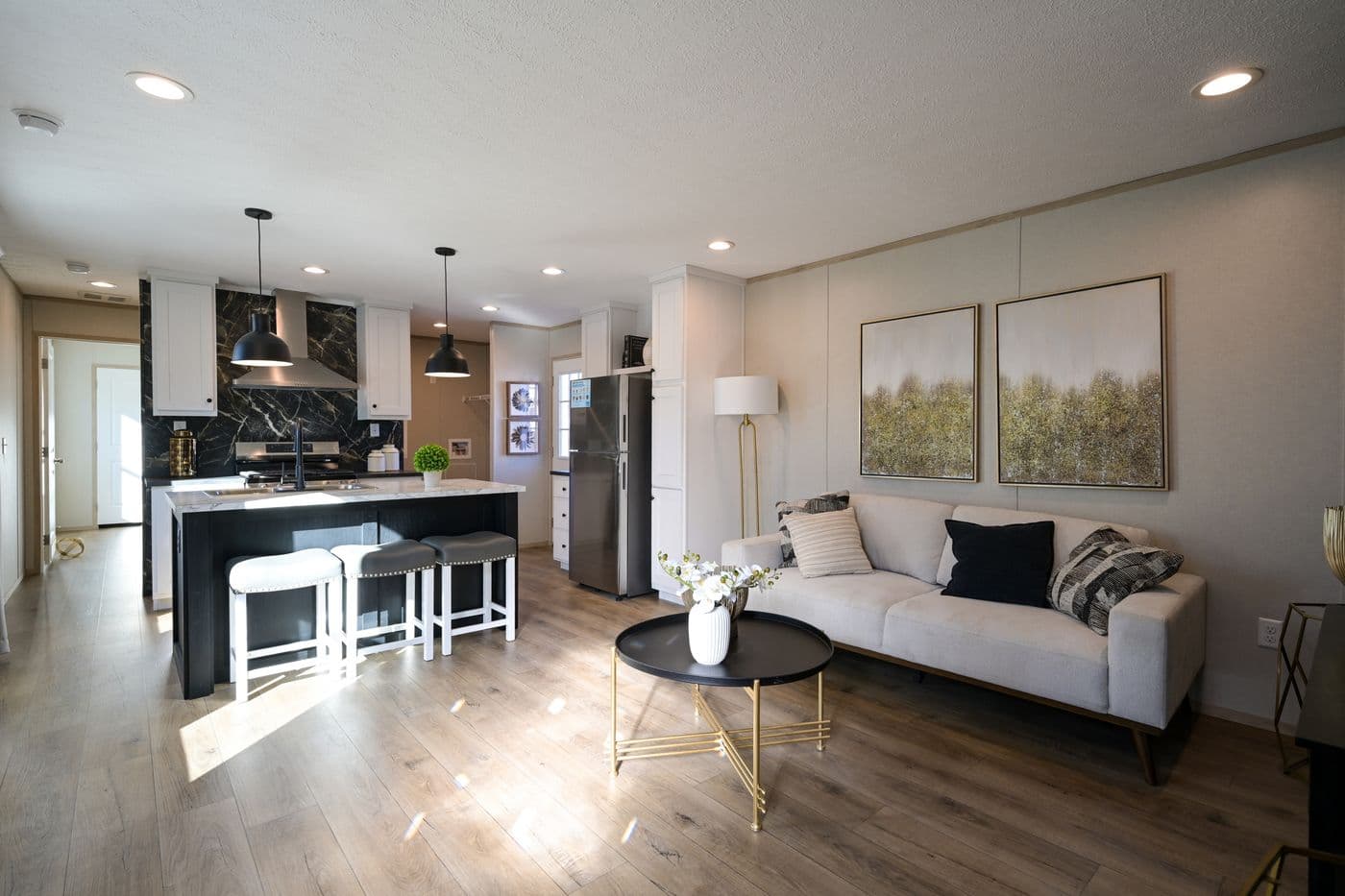The TIGER'S EYE 7416-456 Living Room. This Manufactured Mobile Home features 3 bedrooms and 2 baths.