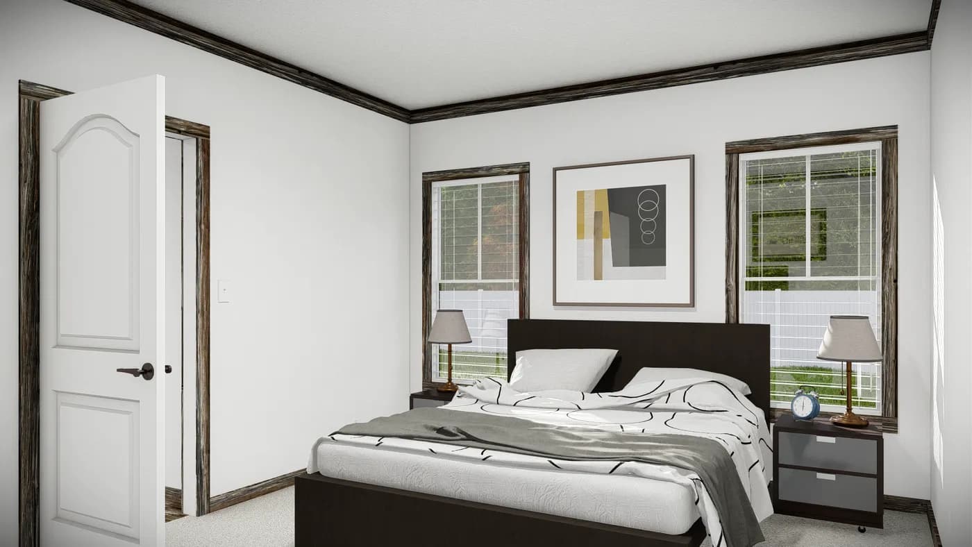 The THE BANDIT Primary Bedroom. This Manufactured Mobile Home features 3 bedrooms and 2 baths.