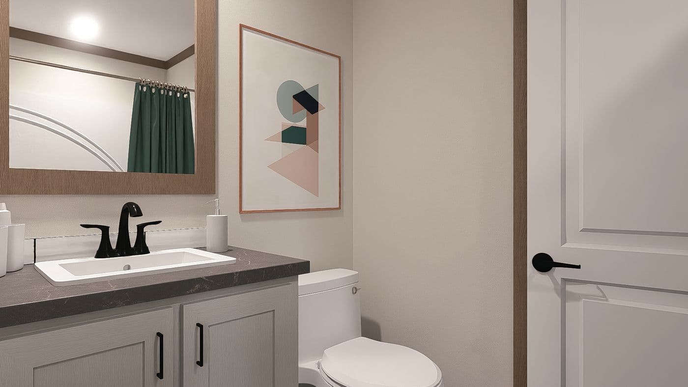 The THE EVERETT Guest Bathroom. This Manufactured Mobile Home features 4 bedrooms and 3 baths.