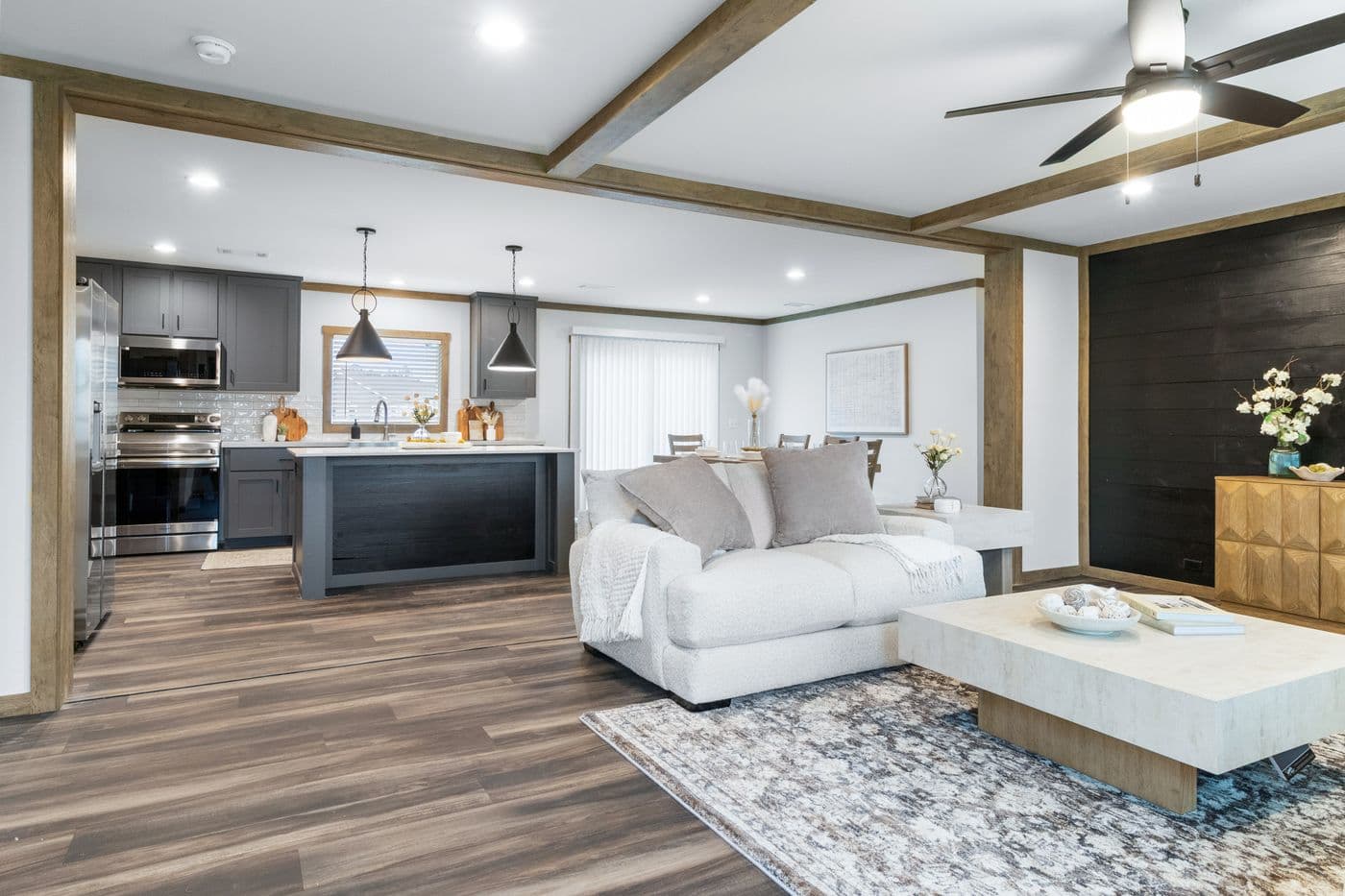 The EVERETT ELITE Living Room. This Manufactured Mobile Home features 4 bedrooms and 3 baths.