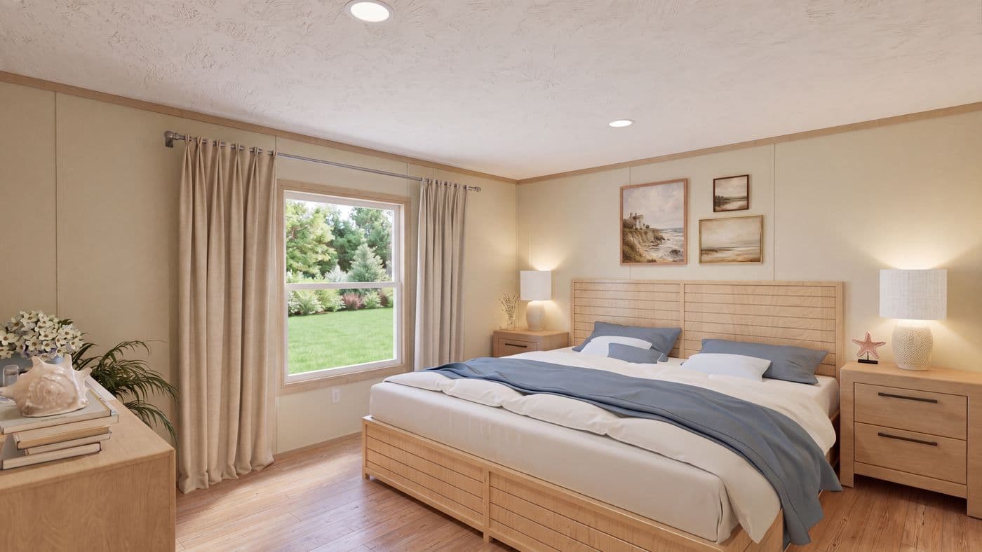 The BOONE Primary Bedroom. This Manufactured Mobile Home features 4 bedrooms and 2 baths.