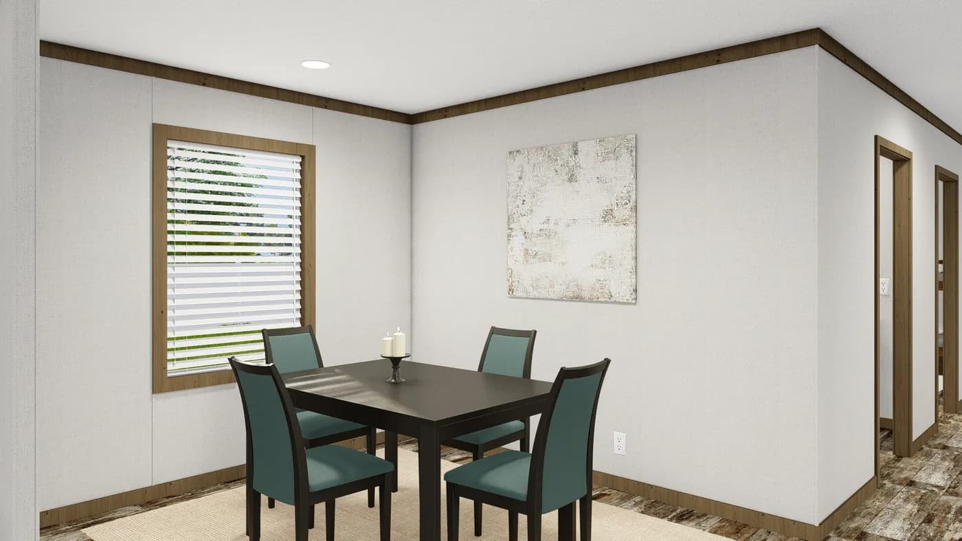 The HOMESTEAD BREEZE Dining Room. This Manufactured Mobile Home features 4 bedrooms and 2 baths.