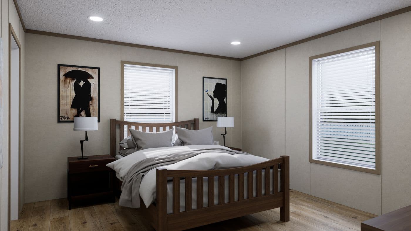 The 4828-CC51 PILLAR 48 Primary Bedroom. This Manufactured Mobile Home features 3 bedrooms and 2 baths.