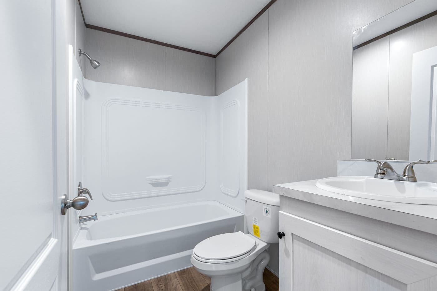 The HOMESTEAD 16602A Guest Bathroom. This Manufactured Mobile Home features 2 bedrooms and 2 baths.