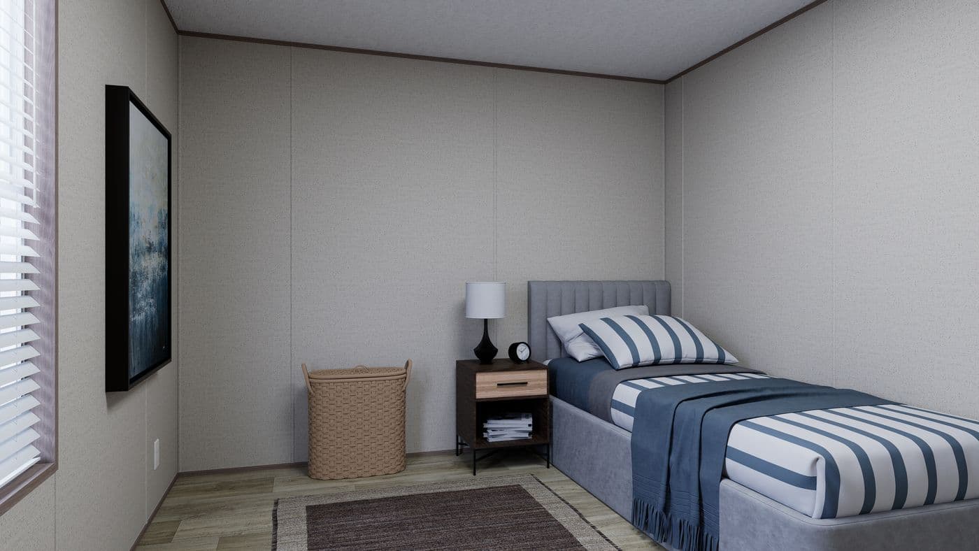 The FOOTHILLS 76 Guest Bedroom. This Manufactured Mobile Home features 3 bedrooms and 2 baths.